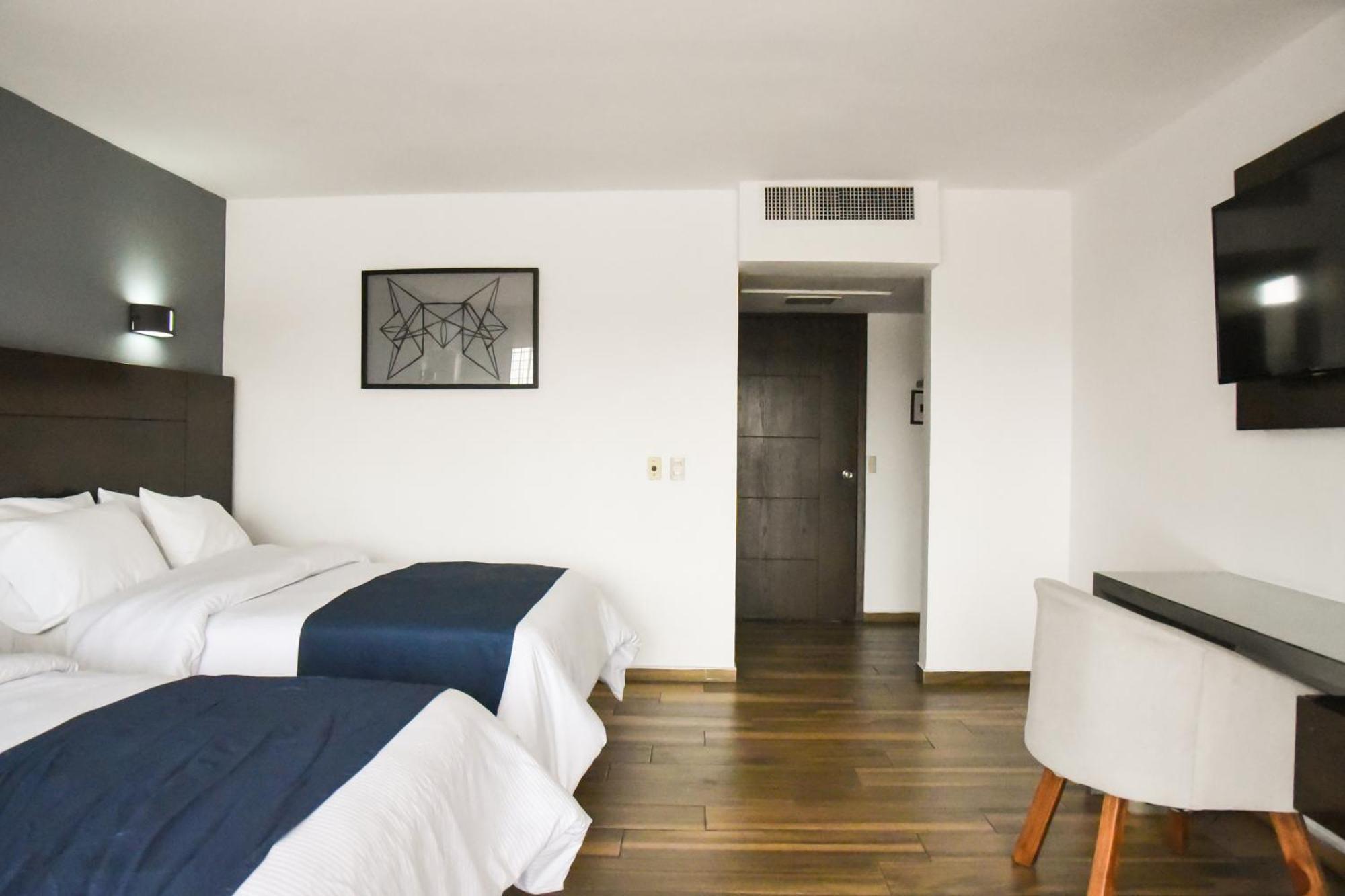 Hotel Expo Plaza Business And Family Guadalajara 萨波潘 外观 照片