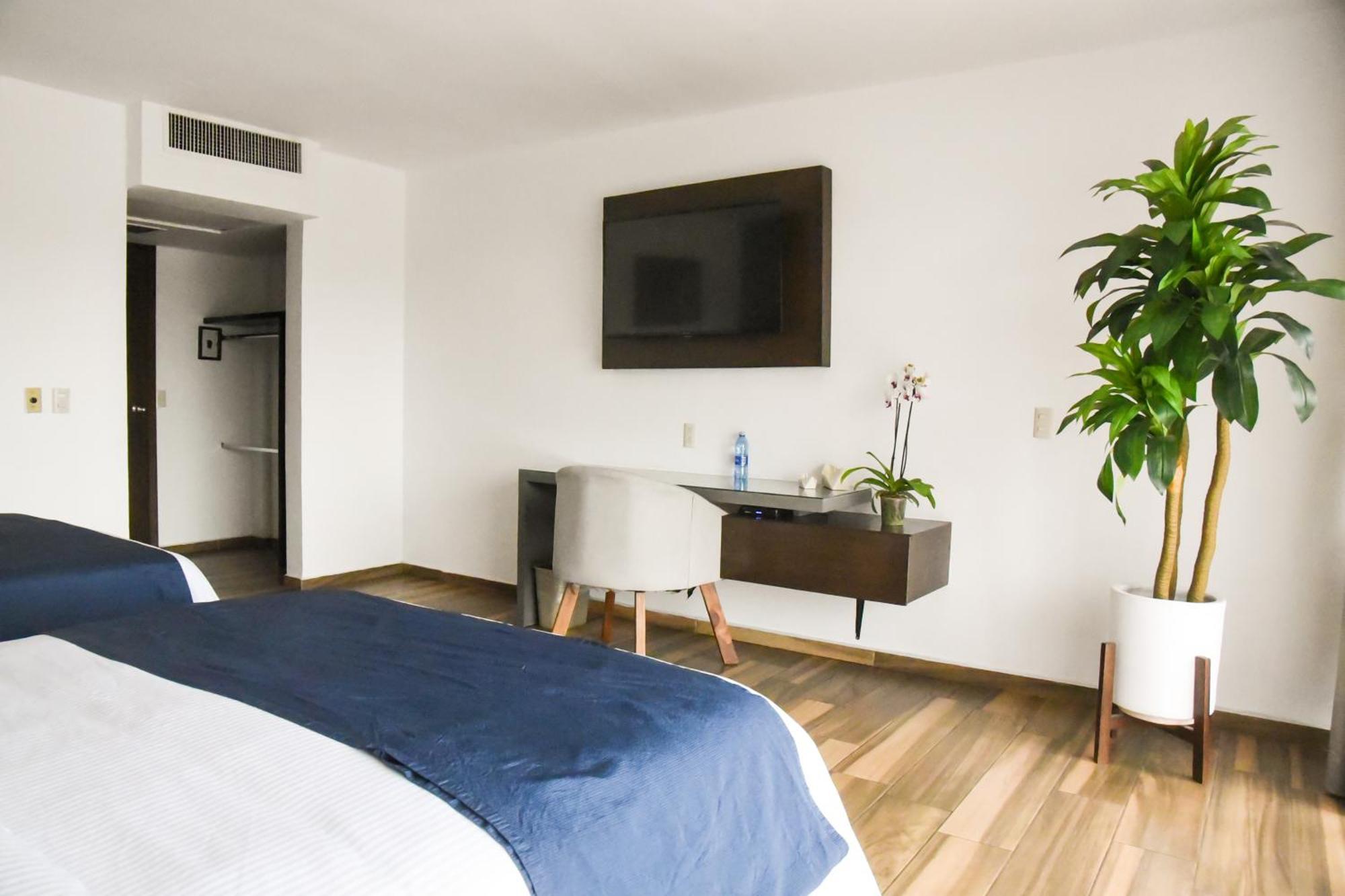 Hotel Expo Plaza Business And Family Guadalajara 萨波潘 外观 照片